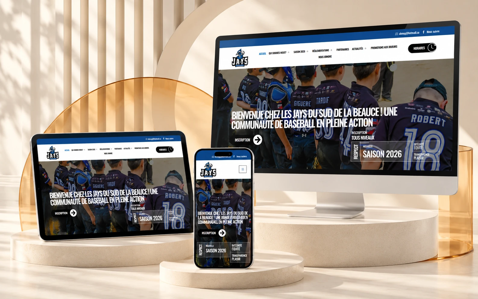 Baseball Sud Beauce website on desktop, tablet and phone, in a light setting with oval plinths and an openwork backdrop
