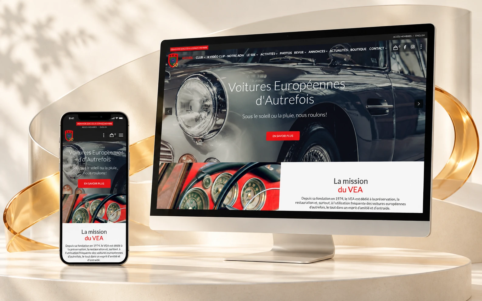 Voitures d’Autrefois website on desktop and phone, in a light setting with a curved podium and a glass ribbon